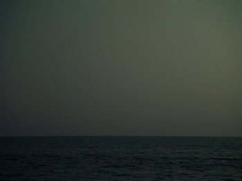 Movie still from “Blue Wilson - Underwater Dance” (2021), directed by Gabriel Jace Long – Extreme Wide shot, Low angle