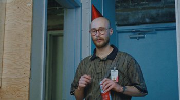 Movie still from “Darryl Kissick - Just A Dream” (2021), directed by Ft. Langley – Medium shot, High angle