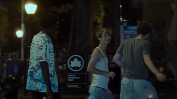 Movie still from “Park Hye Jin - Let’s Sing Let’s Dance” (2021), directed by Kevin Lombardo – Medium shot, Low angle