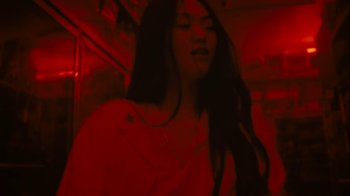Movie still from “Park Hye Jin - Let’s Sing Let’s Dance” (2021), directed by Kevin Lombardo – Close Up shot, Low angle
