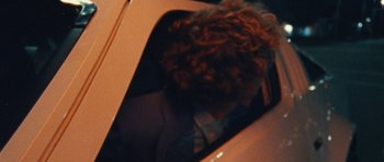 Movie still from “Almost Monday - Cool Enough” (2021), directed by Nico Poalillo – Close Up shot, Over the shoulder angle