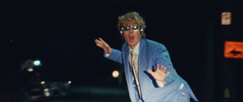 Movie still from “Almost Monday - Cool Enough” (2021), directed by Nico Poalillo – Medium shot, Low angle