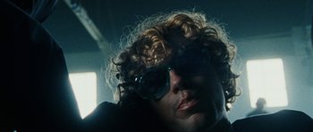 Movie still from “Almost Monday - Cool Enough” (2021), directed by Nico Poalillo – Extreme Close Up shot, Low angle