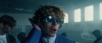 Movie still from “Almost Monday - Cool Enough” (2021), directed by Nico Poalillo – Close Up shot, Low angle