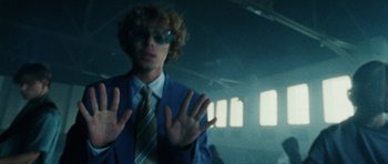 Movie still from “Almost Monday - Cool Enough” (2021), directed by Nico Poalillo – Close Up shot, Low angle