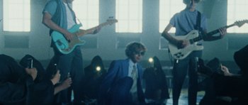 Movie still from “Almost Monday - Cool Enough” (2021), directed by Nico Poalillo – Medium shot, Over the shoulder angle