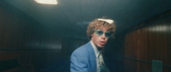 Movie still from “Almost Monday - Cool Enough” (2021), directed by Nico Poalillo – Close Up shot, Low angle