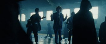 Movie still from “Almost Monday - Cool Enough” (2021), directed by Nico Poalillo – Medium shot, Over the shoulder angle