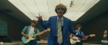 Movie still from “Almost Monday - Cool Enough” (2021), directed by Nico Poalillo – Medium shot, Over the shoulder angle