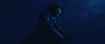 Movie still from “Almost Monday - Cool Enough” (2021), directed by Nico Poalillo – Extreme Close Up shot, Low angle