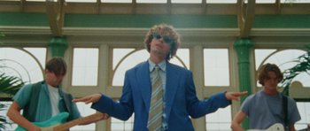 Movie still from “Almost Monday - Cool Enough” (2021), directed by Nico Poalillo – Medium shot, Low angle