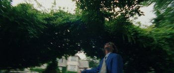 Movie still from “Almost Monday - Cool Enough” (2021), directed by Nico Poalillo – Medium shot, Low angle