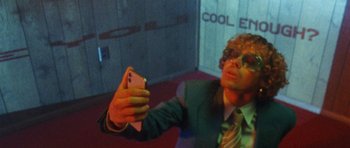 Movie still from “Almost Monday - Cool Enough” (2021), directed by Nico Poalillo – Extreme Close Up shot, Low angle