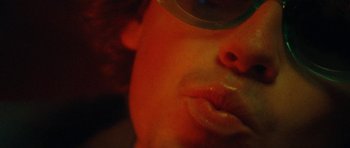 Movie still from “Almost Monday - Cool Enough” (2021), directed by Nico Poalillo – Extreme Close Up shot, Low angle