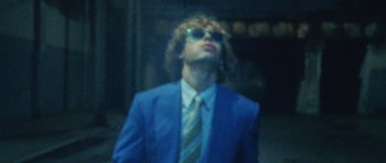 Movie still from “Almost Monday - Cool Enough” (2021), directed by Nico Poalillo – Medium shot, Low angle