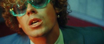 Movie still from “Almost Monday - Cool Enough” (2021), directed by Nico Poalillo – Extreme Close Up shot, Low angle