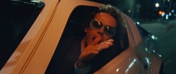 Movie still from “Almost Monday - Cool Enough” (2021), directed by Nico Poalillo – Close Up shot, Low angle