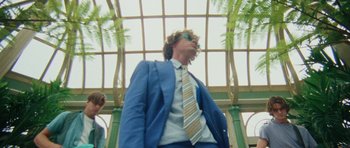 Movie still from “Almost Monday - Cool Enough” (2021), directed by Nico Poalillo – Medium shot, Low angle