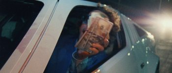 Movie still from “Almost Monday - Cool Enough” (2021), directed by Nico Poalillo – Extreme Close Up shot, Low angle