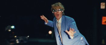 Movie still from “Almost Monday - Cool Enough” (2021), directed by Nico Poalillo – Medium shot, Low angle