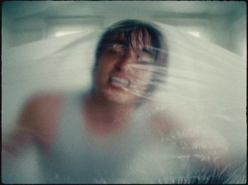 Movie still from “Ben Zaidi - Ben Zaidi’s Blues” (2021), directed by Evers Pund – Extreme Close Up shot, Overhead angle