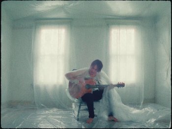 Movie still from “Ben Zaidi - Ben Zaidi’s Blues” (2021), directed by Evers Pund – Wide shot, Low angle