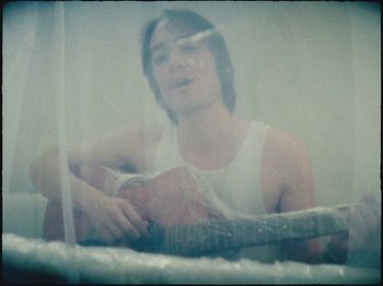 Movie still from “Ben Zaidi - Ben Zaidi’s Blues” (2021), directed by Evers Pund – Close Up shot, High angle