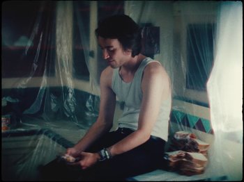 Movie still from “Ben Zaidi - Ben Zaidi’s Blues” (2021), directed by Evers Pund – Medium shot, High angle