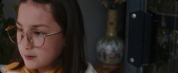 Movie still from “Amanda Sum - Hot Headed Egos” (2021), directed by Hannah Dubois – Close Up shot, High angle