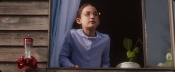 Movie still from “Amanda Sum - Hot Headed Egos” (2021), directed by Hannah Dubois – Medium shot, Low angle