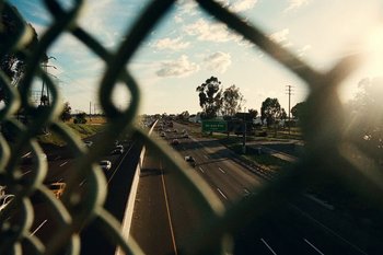 Movie still from “Huey Briss & Nikobeats - Grace Park Legend” (2021), directed by Michael Priestley – Extreme Wide shot, High angle