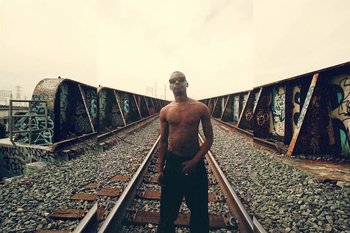 Movie still from “Huey Briss & Nikobeats - Grace Park Legend” (2021), directed by Michael Priestley – Medium shot, Low angle