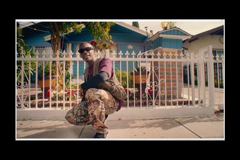 Movie still from “Huey Briss & Nikobeats - Grace Park Legend” (2021), directed by Michael Priestley – Wide shot, Low angle