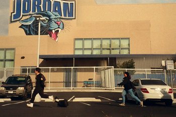 Movie still from “Huey Briss & Nikobeats - Grace Park Legend” (2021), directed by Michael Priestley – Extreme Wide shot, High angle
