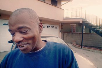 Movie still from “Huey Briss & Nikobeats - Grace Park Legend” (2021), directed by Michael Priestley – Close Up shot, Low angle