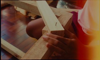 Movie still from “Gilsons & Jovem Dionisio - Algum Ritmo” (2021), directed by Felipe Fonseca – Extreme Close Up shot, Low angle