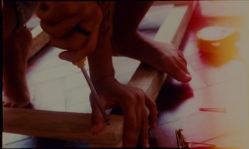 Movie still from “Gilsons & Jovem Dionisio - Algum Ritmo” (2021), directed by Felipe Fonseca – Extreme Close Up shot, Low angle
