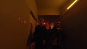 Movie still from “OIO - Przypadkiem” (2021), directed by Łukasz Zabłocki – Medium shot, Low angle