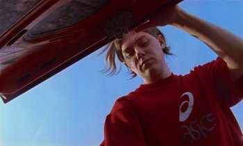 Movie still from “Earl Elliot - Training for a Marathon” (2021), directed by Danny Griffioen – Medium shot, Low angle