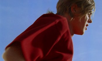 Movie still from “Earl Elliot - Training for a Marathon” (2021), directed by Danny Griffioen – Extreme Close Up shot, Low angle