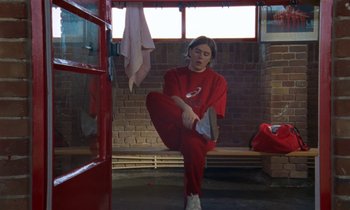 Movie still from “Earl Elliot - Training for a Marathon” (2021), directed by Danny Griffioen – Medium shot, Low angle