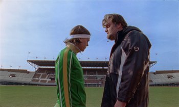 Movie still from “Earl Elliot - Training for a Marathon” (2021), directed by Danny Griffioen – Medium shot, Low angle