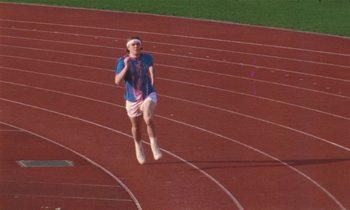 Movie still from “Earl Elliot - Training for a Marathon” (2021), directed by Danny Griffioen – Wide shot, Low angle