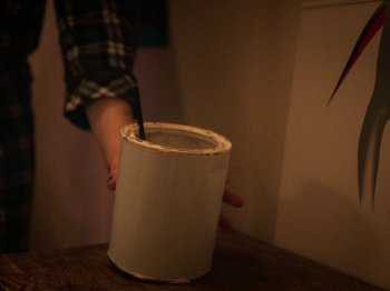 Movie still from “Smoothboi Ezra - Stuck” (2021), directed by Arthur Studholme – Extreme Close Up shot, High angle