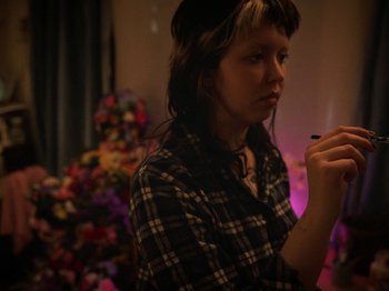 Movie still from “Smoothboi Ezra - Stuck” (2021), directed by Arthur Studholme – Close Up shot, High angle