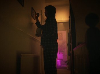 Movie still from “Smoothboi Ezra - Stuck” (2021), directed by Arthur Studholme – Medium shot, Low angle