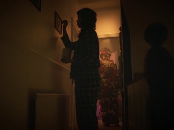Movie still from “Smoothboi Ezra - Stuck” (2021), directed by Arthur Studholme – Wide shot, Low angle