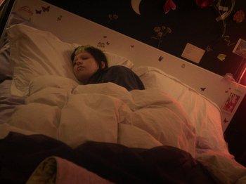 Movie still from “Smoothboi Ezra - Stuck” (2021), directed by Arthur Studholme – Medium shot, High angle