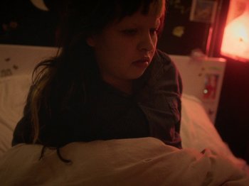 Movie still from “Smoothboi Ezra - Stuck” (2021), directed by Arthur Studholme – Close Up shot, High angle
