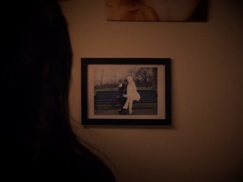 Movie still from “Smoothboi Ezra - Stuck” (2021), directed by Arthur Studholme – Extreme Close Up shot, Over the shoulder angle